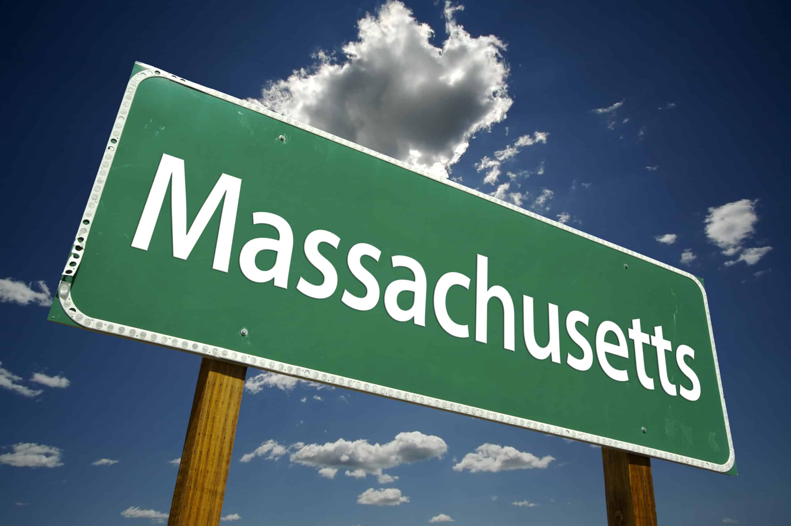 Massachusetts Road Sign with dramatic clouds and sky.